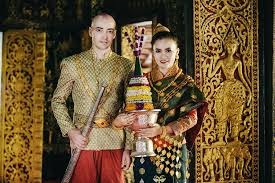 Back in the day, lao people wear the kinds of garments that weren't dyed nor have any patterns on. Elegant Lao Traditional Costume Laos Photography Tours