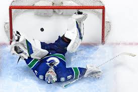 Travis green is the head coach and jim benning is the general manager. Rrgsofm2ntqpqm