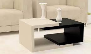 Check out this dining table with a rectangle top and white legs that is strong and elegant. Center Tables To Liven Up Your Living Room Artyz