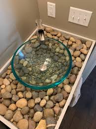 For instance, you may not want to add a huge tub into your bathroom design if you are aiming for the cozy appeal. Diy River Rock Bathroom Counter And Vessel Sink Hometalk