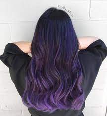 Deep, dark streaks of the indigo mix in with violet, plum, lavender, and pale, icy lilac. Black And Lavender Ombre Long Hair Hair Color For Black Hair Hair Styles Long Hair Styles