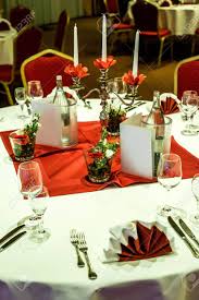 Rated 4.5 out of 5 stars. Banquet With Red Table Setting Tablecloth White Dishes Silver Cutlery Glasses And Decorations White Copy Text Space Card Stock Photo Picture And Royalty Free Image Image 92432323