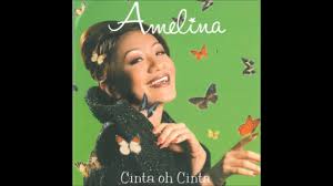 You can streaming and download for free here! Amelina Semakin Rindu Semakin Asyik Official Audio Video Youtube
