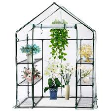Greenhouses made with pvc pipes. Parkland Compact Walk In Greenhouse Pvc Plastic Garden Grow Green House With 4 Shelves Buy Online In Guernsey At Guernsey Desertcart Com Productid 120312178