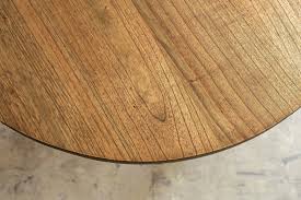 Showcasing the beautiful hues of mango wood our coffee table is defined by the simplicity of its geometrical silhouette. Amara Mid Century Modern Timber Round Coffee Table Wooden Top Coffee Table Living By Design