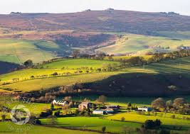 Jack Cheadle's jewellers shop and Lucy Spencer's sweet shop in Bradford  Street, Shifnal, Shropshire, seen in 1965.