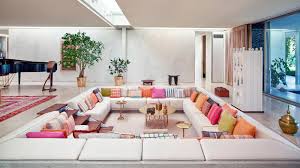 Backyard, conversation set, fire pit, fire pit chat, fire pit table, gas fire pit, gas fire pit table, outdoor decor, outdoor fire pit, outdoor living space, outdoor space, square fire pit, vintage fire pit, wooden fire pit. The Conversation Pit Is Making A Comeback Quartz