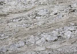 A generous touch of feldspar adds to the beauty of the stone. Stone Design Granite Blue Dunes Polished Suede