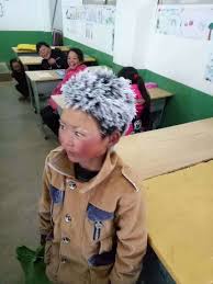 A 2013 study suggested that white or gray hair is considered premature if it pops up before age 30 for black folks, age 25 for folks of asian descent, and age 20 for white folks. Freezing Cold Turns Primary School Student S Hair White Chinadaily Com Cn