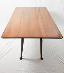 The table features queen anne style legs and a scalloped apron. Sold Price Pennsylvania House Drop Leaf Pembroke Dining Table Invalid Date Est