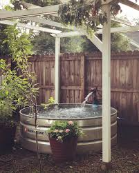 How To Make Your Own Stock Tank Pool This Summer Stock Tank Pool Stock Tank Pool Diy Tank Pool