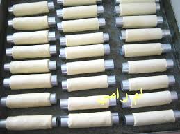 حلوة السيكار وعين الجمل السيكار عين الجمل بعجينة واحدة نحضر عجينة البقلاوة 4 زلايف فرينة كيلة زبدة ذايبة بيضة قرصة ملح ونعجن جمل زبدة