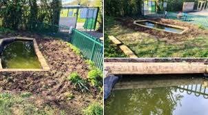 Not the saint, of course, but a statue of him. The School Pond St Joseph S Catholic Primary School Warndon