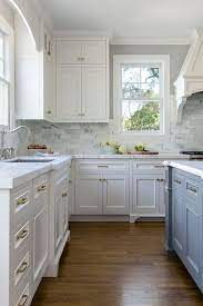 White Kitchen With Stacked Cabinets And Grey Island Home Bunch An Interior Design Luxury Homes Blog Kitchen Cabinet Design Grey Kitchen Cabinets Kitchen Design