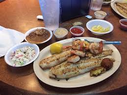 They can be found in all. Grilled Catfish With Grilled Shrimp Sides Of Cole Slaw Red Beans Rice W A Couple Of Hushpup Picture Of Sam S Southern Eatery Fort Smith Tripadvisor