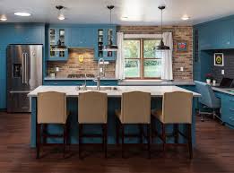 bath with green or blue cabinets