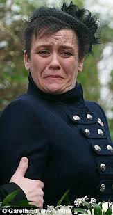 Mother of Rifleman Peter Aldridge weeps at his funeral after he became the  250th casualty of Afghanistan