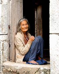 85 Year Old Ivatan Woman Sitting At Her Door Aging Gracefully Old Women Cool Hairstyles