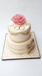 Pretty two tier cake with roses and a few hydrangea, to celebrate banita & nik's engagement. Engagement Cake With Gold Accents Engagement Cake Design Cool Wedding Cakes Engagement Party Cake