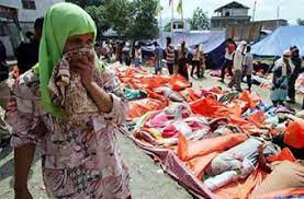 The magnitude 9.1 earthquake struck 30km below the surface along with the dead, thousands more remain missing 10 years on from the disaster. Bodies Piled On Coasts After Tsunami Kills 22 700