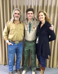 This isn't the Guy Penrod the world usually sees — not the gospel star with  a microphone in hand, but a father standing proudly beside his son, with his  wife by his