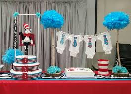 Dr Seuss Diaper Cake Cat In The Hat Baby Shower Theme Onesie Clothes Line Created By Cyd Halto Dr Seuss Baby Shower Seuss Baby Shower Cake Seuss Baby Shower