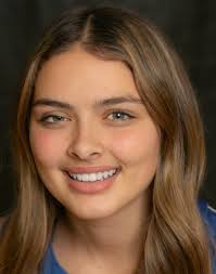 Ida's Schrader follows in mother's footsteps to win Region scoring race