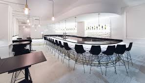 Black And White Restaurant Interior Black And White Restaurant Design Plays On Simplicity White Restaurant White Interior Design Inspiration Restaurant Design
