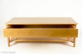 Modern lift top gun storage coffee table. Qline Safeguard Coffee Table Qline Design