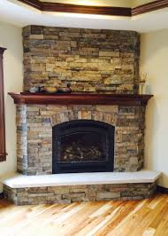 Add the atmosphere of fire into your room in a new way. Corner Fireplace Cherry Mantle Millbrook Ledge Stone Corner Stone Fireplace Corner Fireplace Mantels Chimney Decor