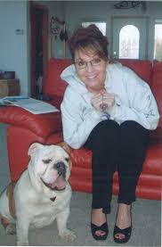 Résultat de recherche d'images pour "sarah palin child stands on dog"