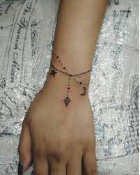 This tattoo will suit you well. 50 Wrist Bracelet Tattoos For Women 2021 With Ankle Designs