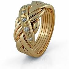 Instead of bending around an engagement ring, the wedding band features a notch that allows the two rings to fit together like puzzle pieces. 14k Gold 5 Band Diamond Puzzle Ring 5gu 5d Puzzle Ring Wedding Rings Sets Gold Engagement Rings For Men