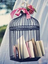 The cage could be trimmed to any height, or you can make multiple baths at different heights to add even more water and character to the garden. 20 Lovely Repurposed Bird Cages