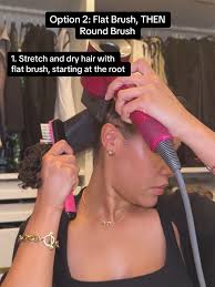 How to Hold Your Round Brush and Blowdryer While Geting Another Section