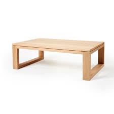 Create a coffee table that resembles a large chest perfect for storage as well as a cozy ottoman. Timber And Marble Coffee Tables Ackermann