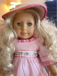 American Girl Doll Caroline 2012-Retires 2015. Set includes Doll, Meet  outfit, nightgown , shoes hat