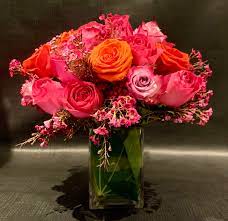 In this comprehensive guide, you'll learn about all the types, names and varieties of roses. Custom Arrangement Of Pink Roses Orange Roses Pink Wax Flower In Clear Glass Cube With Leaf Wrap In New York Ny Richard Salome Flowers Inc