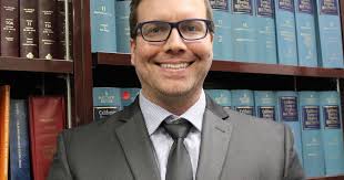 Adam Crook Appointed as New County Counsel