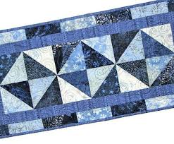 Quilted Christmas Table Runner Blue White Holiday Table Mat Snowflakes And Stars Winter Table Topper 25 X12 Quiltsy Handmade Quilted Table Runners Patterns Quilted Table Runners Christmas Table Runner