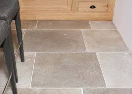 Quality natural limestone flagstone flooring. Branscombe Tumbled Limestone Grey Floor Tiles Neptune
