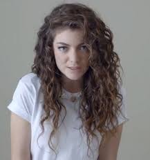 Pin By Cori White On Hairstyles Lorde Hair Curly Hair Styles Curly Hair Side Part