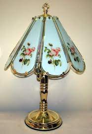 Maybe you would like to learn more about one of these? Rose Antique Design 8 Panel Touch Lamp