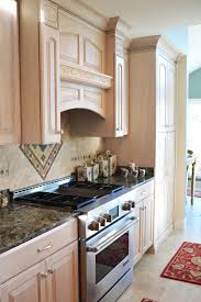 Stain the front of the cabinet doors with light and even strokes to avoid clumping. Light Stain Kitchen Cabinets Horst Cabinet Works