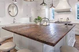 If you don't have enough space to add kitchen shelving, don't despair. Reclaimed Wood Countertop Island