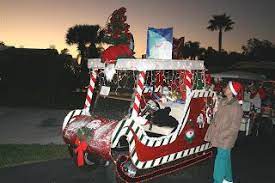 When attaching garlands to the top of the golf cart, you could run cords or a netting across then tie the garlands to that. 16 Christmas Golf Cart Parade Ideas Christmas Golf Golf Cart Decorations Golf