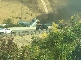 The pilot was safely removed before the plane burst into flames. California Plane Crash Light Aircraft Smashes Into Los Angeles County Highway The Independent The Independent