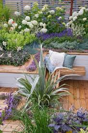 Sunken Deck Landscaping And Garden Plant Flower Stock Photography Gardenphotos Com Garden Seating Area Planting Flowers Garden Design