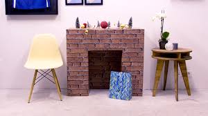 Une cheminée pour noël : Tuto Fabriquer Une Fausse Cheminee En Briques Pour Noel M6 Deco Fr