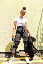 Some of the best colors you can choose for black shirt combination pants is black shirts grey pants, black shirt with blue jeans, or something as bright as white. Woman Wearing White Shirt And Black Pants Photo Free Birmingham Image On Unsplash